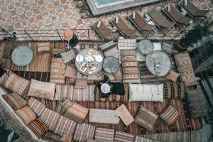 an overhead view of a table and chairs in a room at Local Cave House Hotel in Göreme