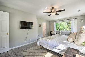 a bedroom with a bed and a ceiling fan at Annapolis Vacation Home 2 Mi to Quiet Waters Park in Annapolis