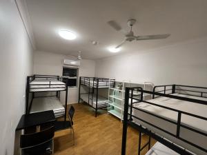 Postel nebo postele na pokoji v ubytování Tomato Backpackers