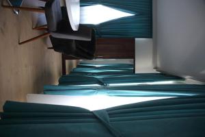 Postel nebo postele na pokoji v ubytování A&F Hotel Chemnitz