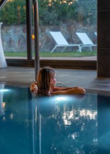 Bazén v ubytování Hotel TorreMirona Golf & Spa nebo v jeho okolí