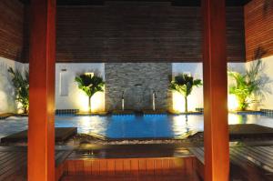 Bazén v ubytování Forty Winks Phuket Hotel nebo v jeho okolí + 37 fotografií