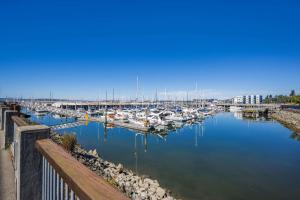 a marina with many boats in the water at Inn at Port Gardner-Everett Waterfront, Ascend Hotel Collection in Everett