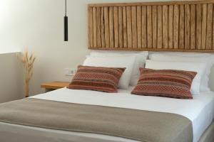 Posteľ alebo postele v izbe v ubytovaní Triantafilia Guesthouse