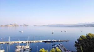 a large body of water with boats docked at 12 Gods Resort in Pylos