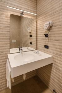 Koupelna v ubytování Hotel Cora