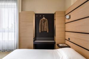 Postel nebo postele na pokoji v ubytování Hotel Cora