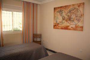 Cama o camas de una habitación en Casa en Marbella
