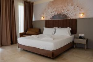 Postel nebo postele na pokoji v ubytování Fllad Resort & SPA Durres