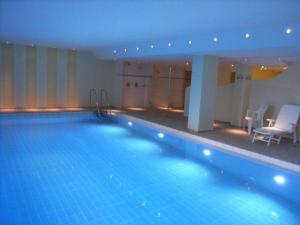 a large swimming pool in a hotel room at Haus Nordland Haus Nordland Wohnung 66 in Westerland