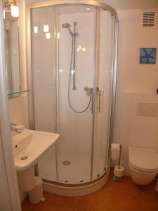 Koupelna v ubytování Haus Nordseeresidenz Wohnung 35