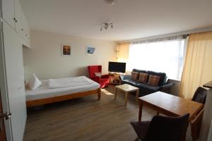 Postel nebo postele na pokoji v ubytování Haus Nordseeresidenz Wohnung 94