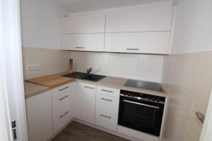 Kuchyň nebo kuchyňský kout v ubytování Haus Nordseeresidenz Wohnung 94