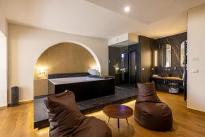 Кровать или кровати в номере Relais Masseria Caselli