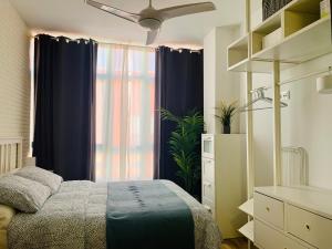 Postel nebo postele na pokoji v ubytování Palm apartment