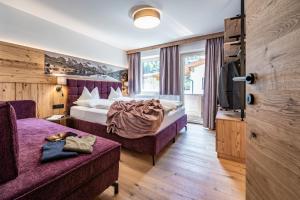 Televízia a/alebo spoločenská miestnosť v ubytovaní Schönblick Appartements