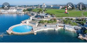 an aerial view of a resort on a body of water at Beautiful holiday home near Plymouth for 4 in Plymouth