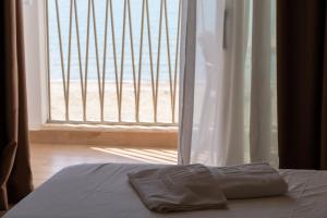 Postel nebo postele na pokoji v ubytování Fllad Resort & SPA Durres