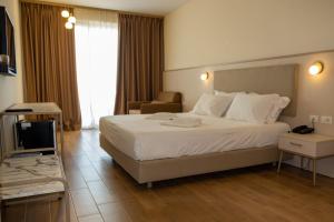 Postel nebo postele na pokoji v ubytování Fllad Resort & SPA Durres