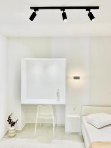 Posteľ alebo postele v izbe v ubytovaní White studio (Preveza Marina)