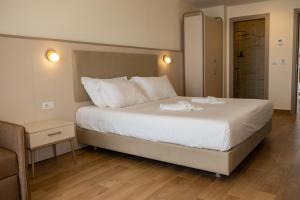 Postel nebo postele na pokoji v ubytování Fllad Resort & SPA Durres
