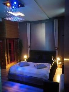 Posteľ alebo postele v izbe v ubytovaní L' Apparte Spa