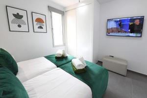 Telewizja i/lub zestaw kina domowego w obiekcie Salobre La Isla 8