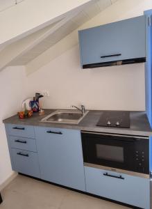Virtuve vai virtuves zona naktsmītnē Julietta Suites
