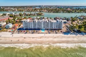 an aerial view of a hotel on the beach at Sunset Chateau 207 in St Pete Beach