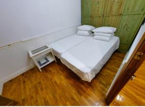 Posteľ alebo postele v izbe v ubytovaní CB88