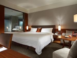 Letto o letti in una camera di Silks Place Yilan