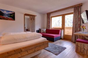 Telewizja i/lub zestaw kina domowego w obiekcie Pension Roman