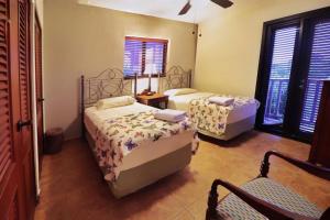 Giường trong phòng chung tại Suite Granada 131 Gran Pacifica Resort