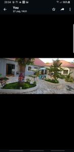 a screenshot of a picture of a house at The bb's in Brusubi