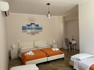 Postel nebo postele na pokoji v ubytování B&B Ranieri