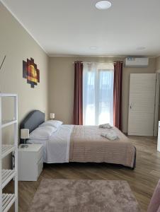 Postel nebo postele na pokoji v ubytování B&B Ranieri