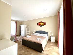 Postel nebo postele na pokoji v ubytování B&B Ranieri