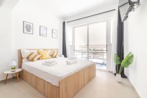 Posteľ alebo postele v izbe v ubytovaní New Studio in the Heart of City Center