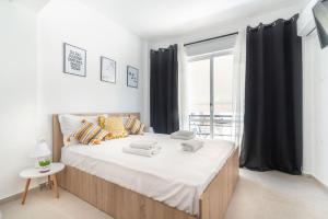 Posteľ alebo postele v izbe v ubytovaní New Studio in the Heart of City Center