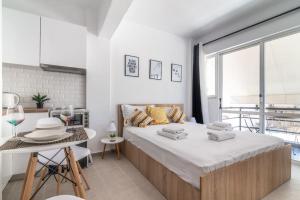 Posteľ alebo postele v izbe v ubytovaní New Studio in the Heart of City Center