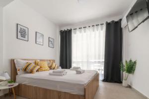 Posteľ alebo postele v izbe v ubytovaní New Studio in the Heart of City Center