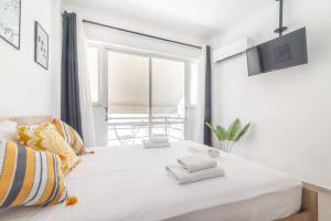 Posteľ alebo postele v izbe v ubytovaní New Studio in the Heart of City Center