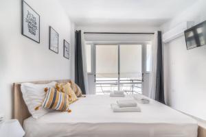 Posteľ alebo postele v izbe v ubytovaní New Studio in the Heart of City Center