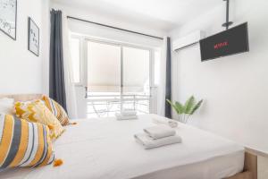 Posteľ alebo postele v izbe v ubytovaní New Studio in the Heart of City Center