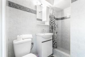 Kúpeľňa v ubytovaní New Studio in the Heart of City Center