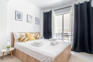 Posteľ alebo postele v izbe v ubytovaní New Studio in the Heart of City Center