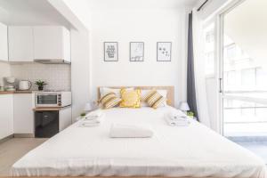 Posteľ alebo postele v izbe v ubytovaní New Studio in the Heart of City Center