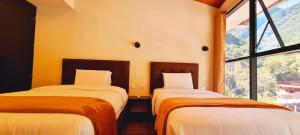 Letto o letti in una camera di Hotel Raices Machupicchu