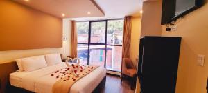 TV a/nebo společenská místnost v ubytování Hotel Raices Machupicchu