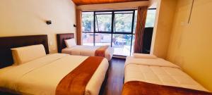 Letto o letti in una camera di Hotel Raices Machupicchu